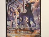an image of a pokemon card with a picture of a black cat