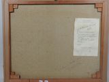 an old picture of a piece of art with a piece of paper attached to it