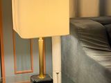 a lamp that is sitting on a table in a living room
