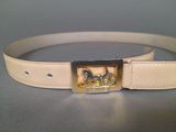 a picture of a belt with a horse buckle on it