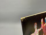a picture of a book with a picture of a man and a woman on it