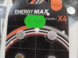 three piles of batteries sitting on top of each other on a table