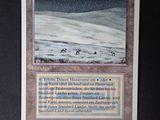 a close up of a card with a picture of a snow covered mountain
