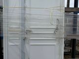 a picture of a door that is wrapped in plastic