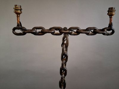 an image of a candle holder made out of chains