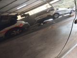 a reflection of a car in the side mirror of a car