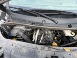 a car that has its hood open with the hood up