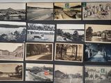 many old photographs of a town on the wall