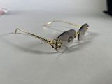 a close up of a pair of sunglasses on a table