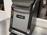 a machine that is sitting on a table in the kitchen