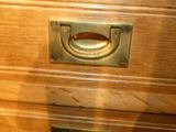a close up of a drawer with a handle on it