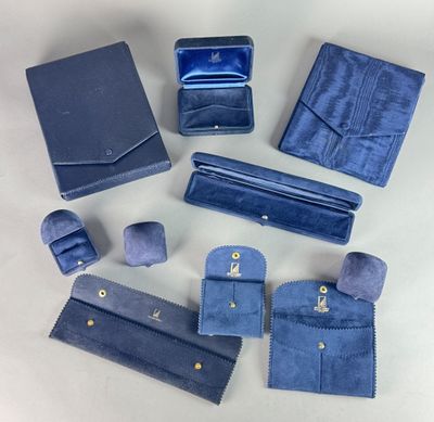 several pieces of blue leather are laid out on a table