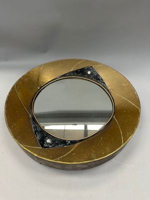 miroir plaqué laiton orné d'un motif en noir et blanc