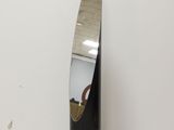 a mirror that is sitting on a table