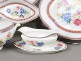 many different types of china on display on the table