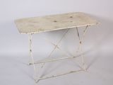 an image of a small table with a white top and legs