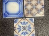 three different types of tile on the floor in a room