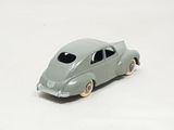 a toy car that is sitting on a white surface