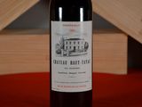 a bottle of wine that is sitting on a table