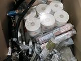 a cardboard box filled with many different types of electronic equipment