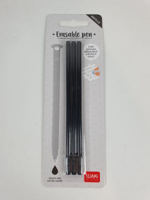 a close up of a package of black pens on a white surface