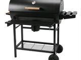 an image of a black barbecue grill with wheels on a white background