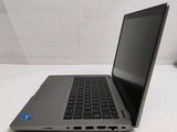 a laptop computer that is sitting on a table