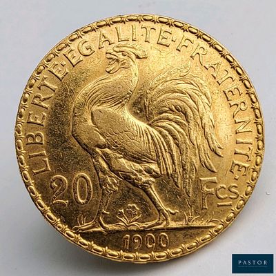 l'image d'une pièce d'or ornée d'un coq