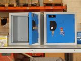 two blue lockers sitting on a shelf in a warehouse