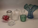 a lot of glass items sitting on a table