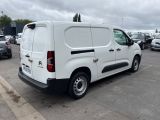 a white van that is parked in a parking lot