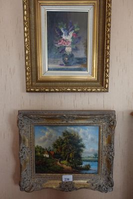 two paintings hanging on the wall in a room