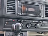 a dashboard of a car with a radio and a steering wheel
