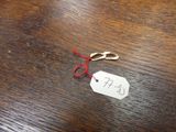 a piece of paper with a price tag attached to it
