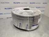 an image of a roll of aluminum wire on a table