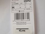 a white tag with a barcode on it on a table