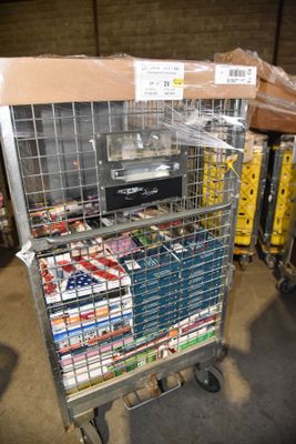a metal cart with many items in it in a warehouse