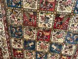 a picture of a quilt with many different designs on it