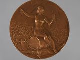 bronze medal of a woman with a bow and arrow on a white background