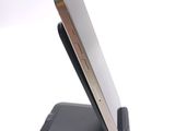 a cell phone that is sitting on top of a cell phone stand