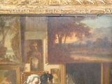 une peinture représentant un homme et une femme assis à une table