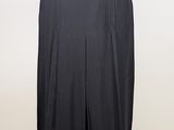 a black dress with a gold belt on a mannequin mannequin