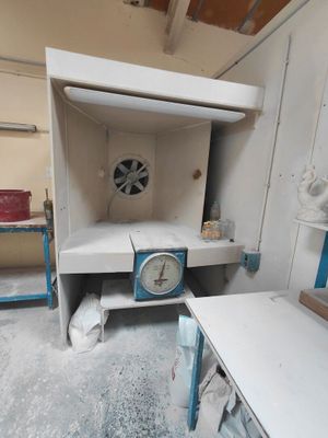 a small room with a clock in the middle of it