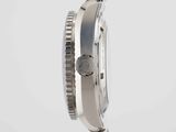 an image of a close up of a watch on a white surface