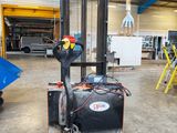 an image of a fork lift truck in a warehouse