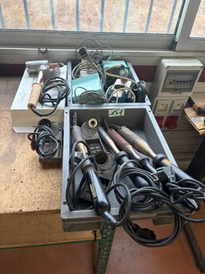a table with a bunch of electrical equipment on it