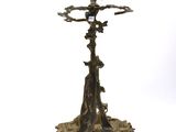 an image of a metal candle holder with a bird on it
