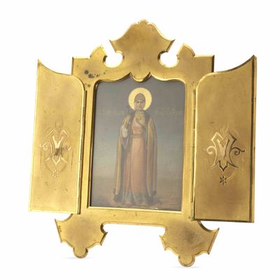 un cadre doré contenant une image de la Vierge Marie et de l'Enfant Jésus