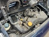 a small engine in the trunk of a car