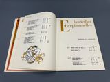 an open book with a picture of a dog on it